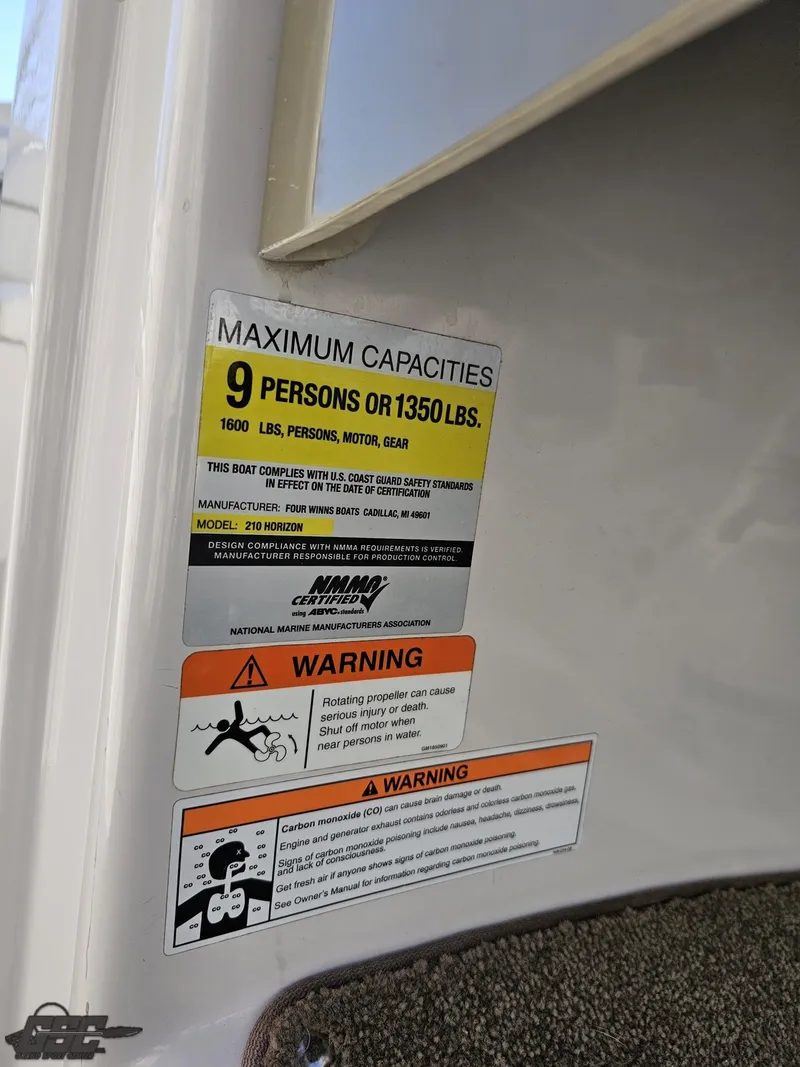 Slide: The Image of Capacity warning label on 2007 Four Winns 210 Horizon boat, 9 persons or 1350 lbs. - 47
