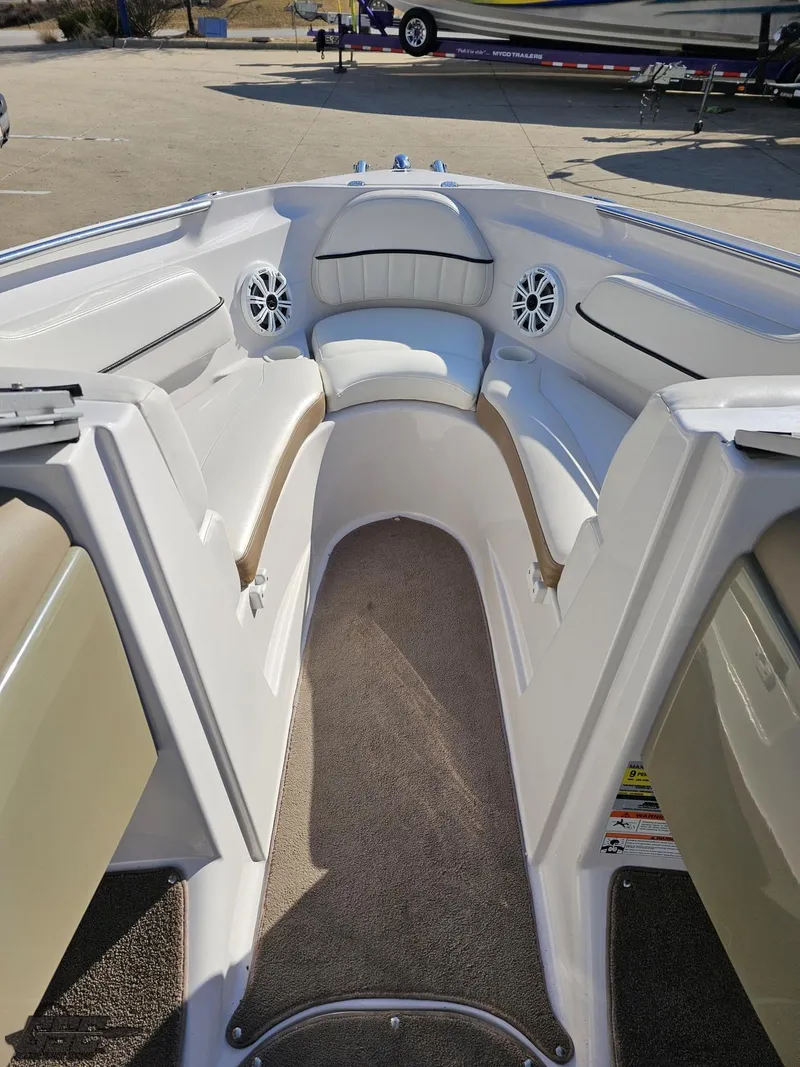 Slide: The Image of 2007 Four Winns 210 Horizon boat interior with seating and speakers. - 49