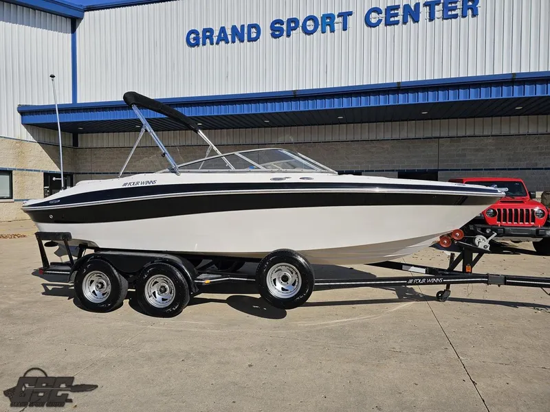 Slide: The Image of 2007 Four Winns 210 Horizon boat on trailer at Grand Sport Center. - 7