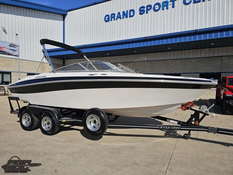 Slide: The Image of 2007 Four Winns 210 Horizon boat on trailer at Grand Sport Center. - 8