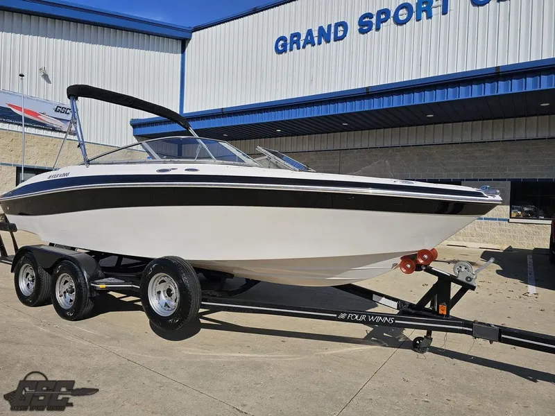 Slide: The Image of 2007 Four Winns 210 Horizon boat on trailer at Grand Sport Center. - 9