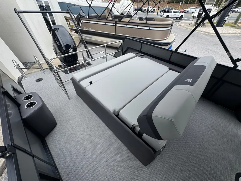 Slide: The Image of 2025 Viaggio Lago X-S boat interior with gray seating and cup holders. - 4