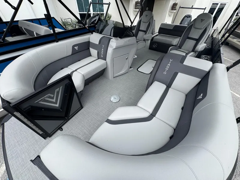 Slide: The Image of 2025 Viaggio Lago X-S boat interior with luxurious gray seating and modern design. - 9