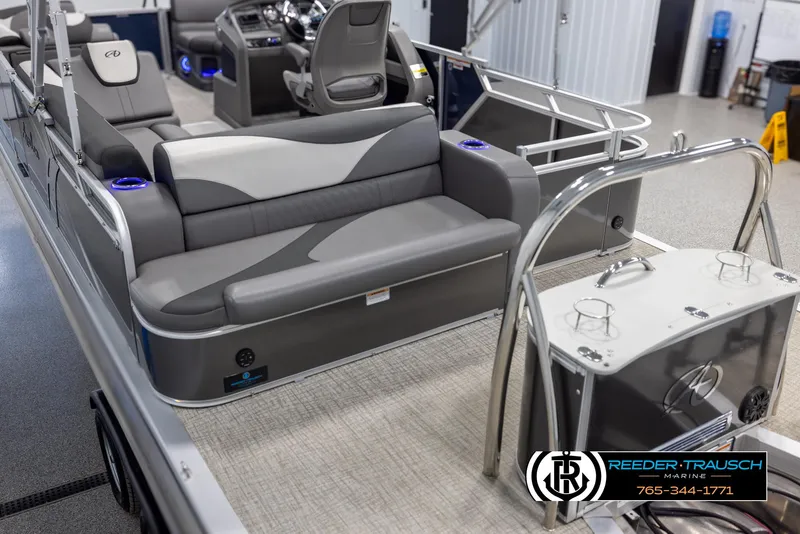 Slide: The Image of 2022 Avalon 2285 LSZ CRB pontoon boat interior with gray seating and modern design. - 11