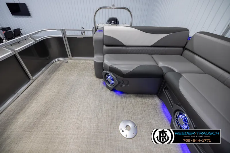 Slide: The Image of 2022 Avalon 2285 LSZ CRB pontoon boat interior with stylish seating and blue LED lighting. - 15