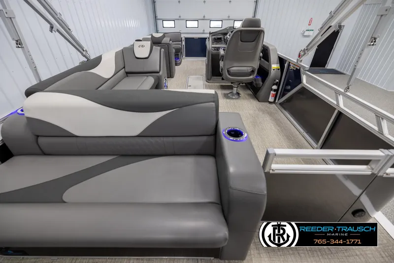 Slide: The Image of Interior of 2022 Avalon 2285 LSZ CRB pontoon boat with modern seating and helm. - 16