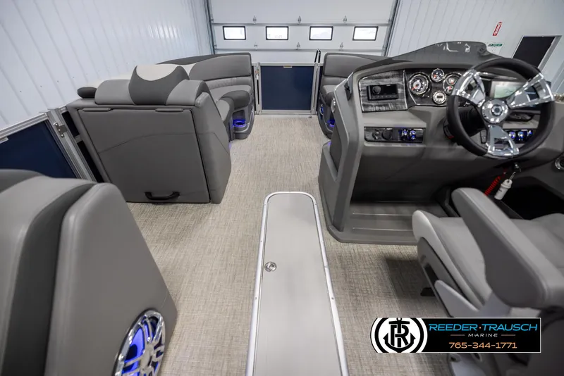 Slide: The Image of 2022 Avalon 2285 LSZ CRB boat interior with modern dashboard and seating. - 17