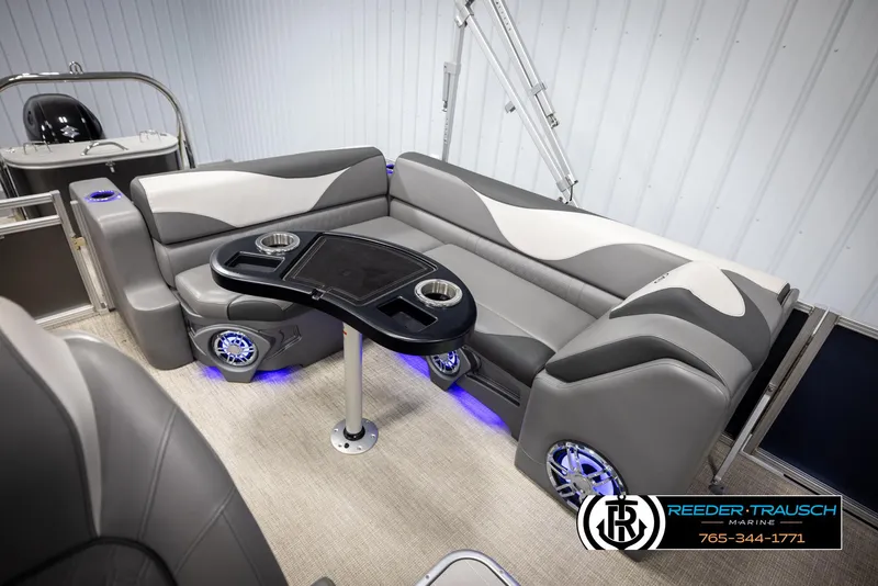 Slide: The Image of 2022 Avalon 2285 LSZ CRB pontoon boat interior with stylish seating and table. - 23