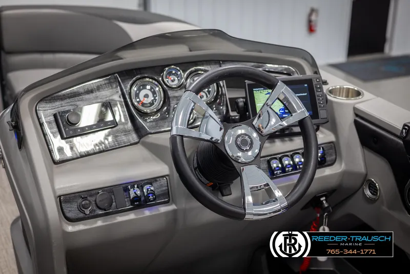 Slide: The Image of Steering console of 2022 Avalon 2285 LSZ CRB boat with modern controls and gauges. - 27