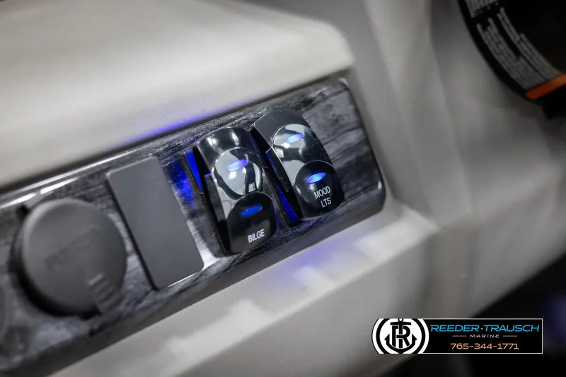 Slide: The Image of Control panel of 2022 Avalon 2285 LSZ CRB boat with illuminated switches. - 29