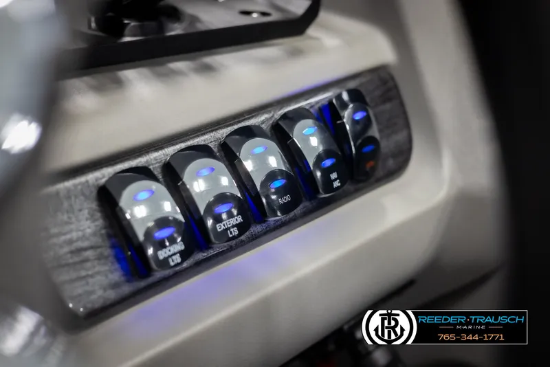 Slide: The Image of Control panel of 2022 Avalon 2285 LSZ CRB boat with illuminated switches. - 33