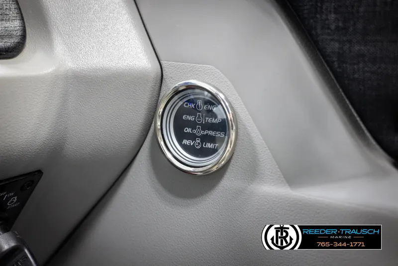 Slide: The Image of 2022 Avalon 2285 LSZ CRB dashboard gauge with engine indicators and Reeder-Trausch Marine logo. - 35