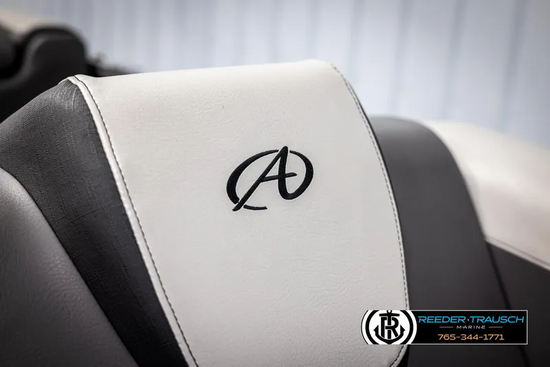 Slide: The Image of 2022 Avalon 2285 LSZ CRB boat seat with logo, featuring sleek black and white design. - 38