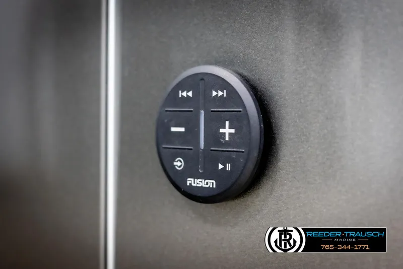 Slide: The Image of Control panel on 2022 Avalon 2285 LSZ CRB boat, featuring Fusion audio system. - 41