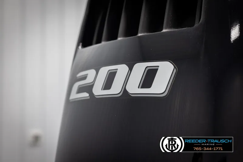 Slide: The Image of Close-up of 200 horsepower engine detail on 2022 Avalon 2285 LSZ CRB. - 45
