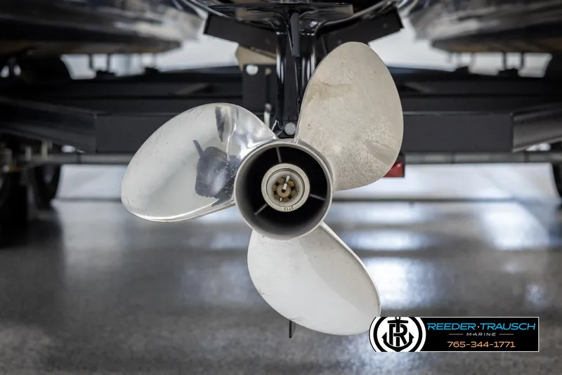 Slide: The Image of Close-up of a 2022 Avalon 2285 LSZ CRB boat propeller in a showroom. - 46