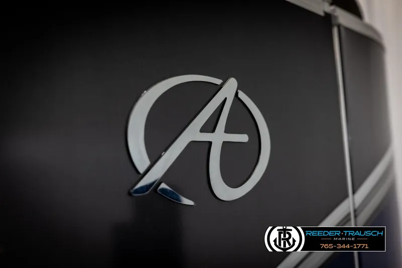 Slide: The Image of 2022 Avalon 2285 LSZ CRB logo on dark surface, Reeder-Trausch Marine branding. - 47