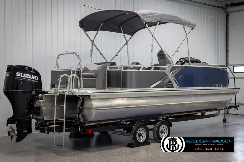 Slide: The Image of 2022 Avalon 2285 LSZ CRB pontoon boat with Suzuki outboard motor in showroom. - 6