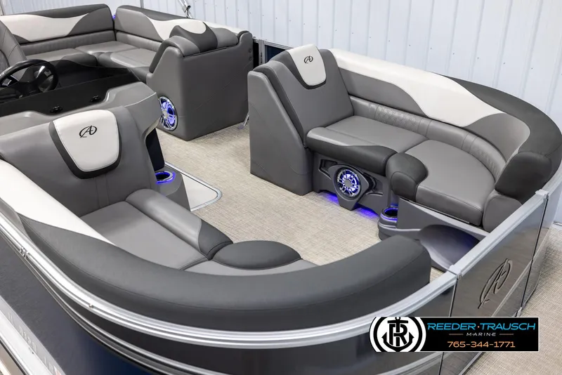 Slide: The Image of 2022 Avalon 2285 LSZ CRB pontoon boat interior with gray seating and blue LED lighting. - 9