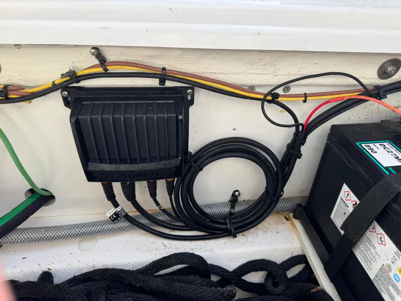 Slide: The Image of Electrical wiring and battery setup in a 2021 Cutwater C-24 Coupe boat. - 17