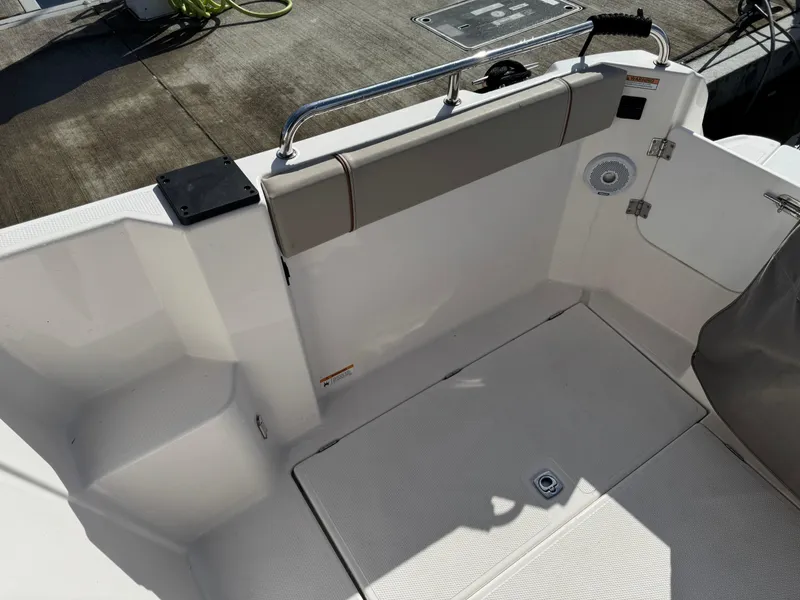 Slide: The Image of 2021 Cutwater C-24 Coupe boat interior with seating and deck details. - 18