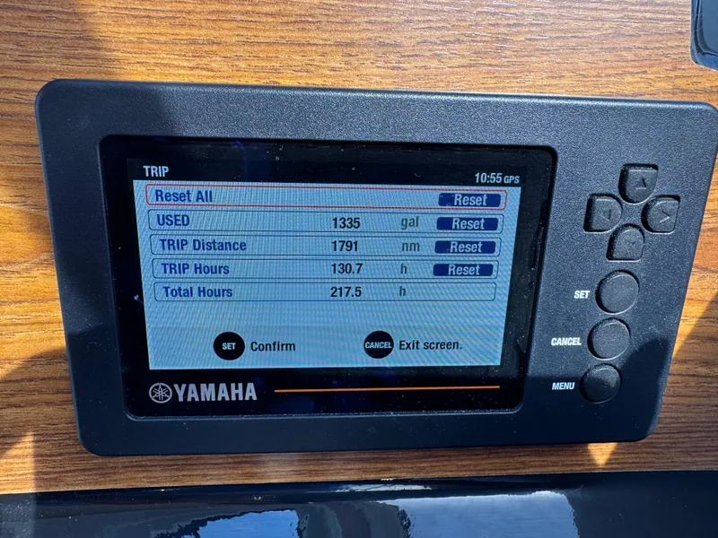 Slide: The Image of Yamaha display on 2021 Cutwater C-24 Coupe showing trip data and fuel usage. - 30