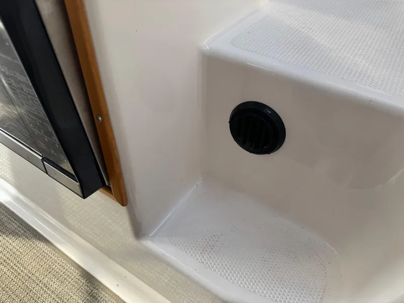 Slide: The Image of 2021 Cutwater C-24 Coupe interior detail with vent and step. - 34