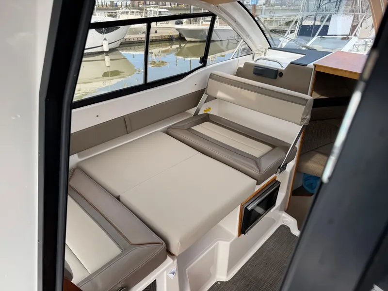 Slide: The Image of 2021 Cutwater C-24 Coupe interior with convertible seating and modern design. - 43