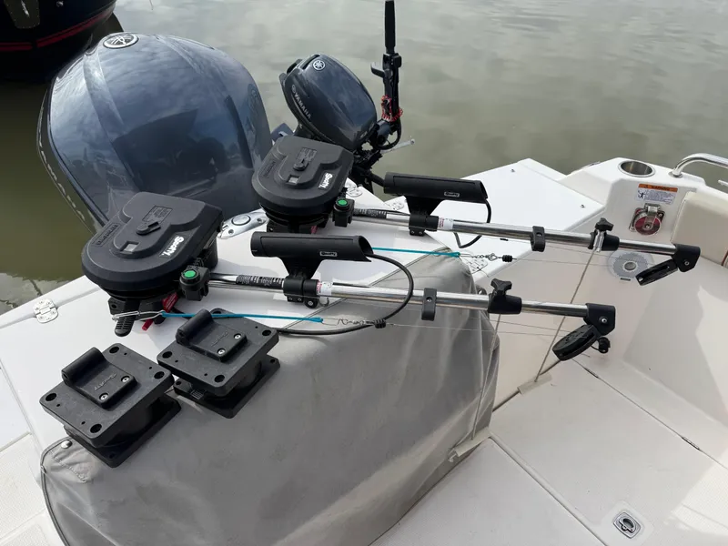 Slide: The Image of 2021 Cutwater C-24 Coupe boat with fishing equipment on deck. - 46