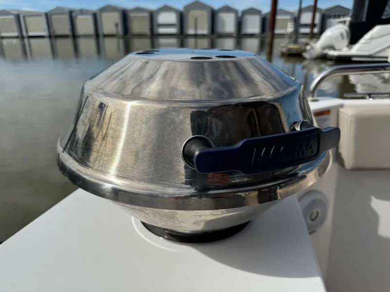 Slide: The Image of Stainless steel boat accessory on 2021 Cutwater C-24 Coupe, docked near water. - 47