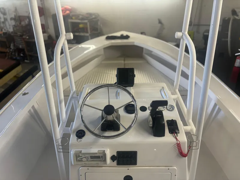 Slide: The Image of 1971 SeaCraft Barcone 21 CC boat interior with steering wheel and controls. - 10