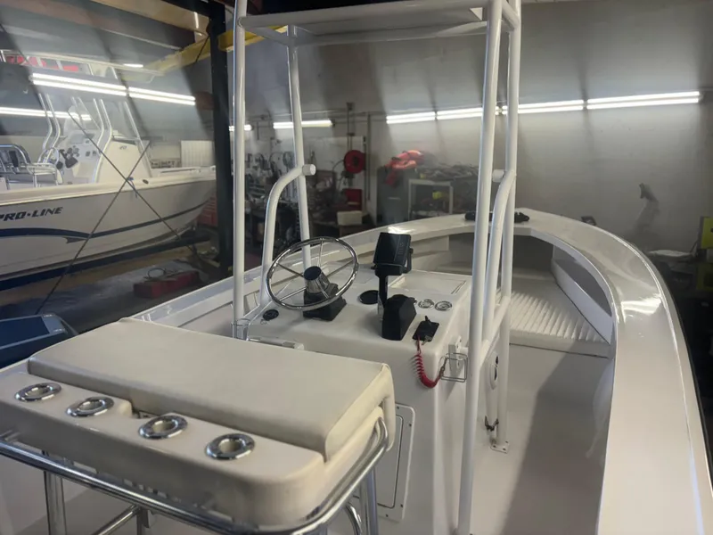 Slide: The Image of 1971 SeaCraft Barcone 21 CC boat interior with steering console and seating. - 11