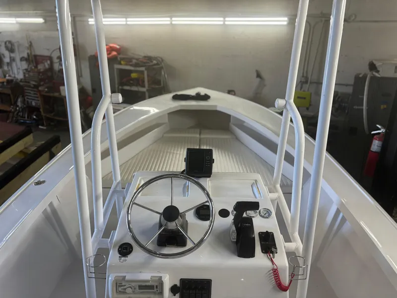 Slide: The Image of 1971 SeaCraft Barcone 21 CC boat interior with steering wheel and controls. - 9