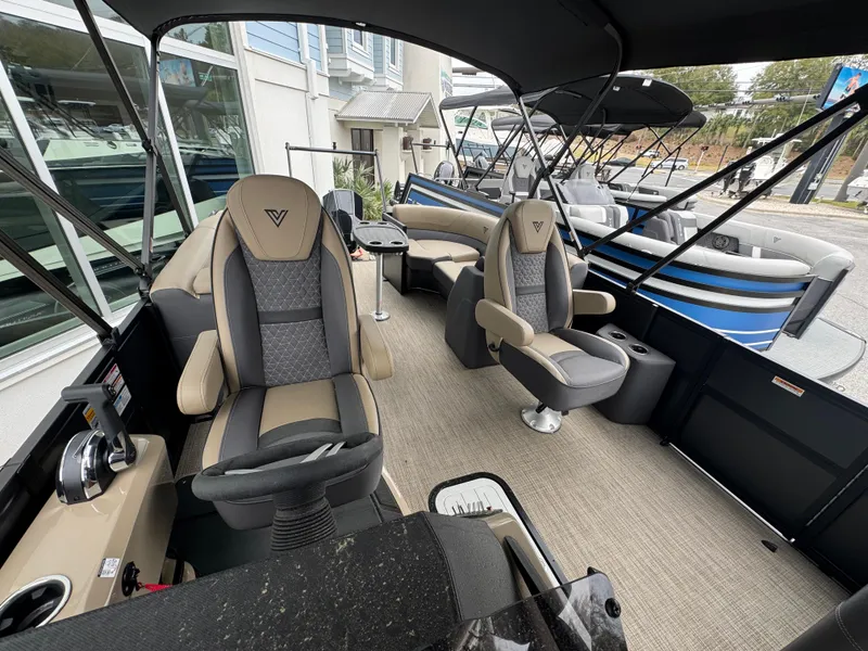 Slide: The Image of 2025 Viaggio Lago Z-U boat interior with modern seating and controls, showcasing luxury design. - 6