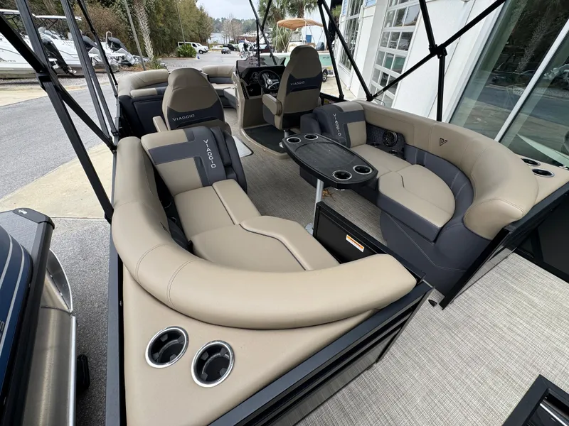 Slide: The Image of Luxurious interior of 2025 Viaggio Lago Z-U boat with plush seating and cup holders. - 7