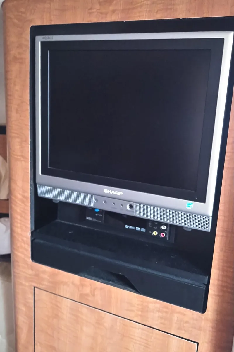 Slide: The Image of Sharp TV in 2006 Sea Ray 280 Sundancer boat interior. - 18