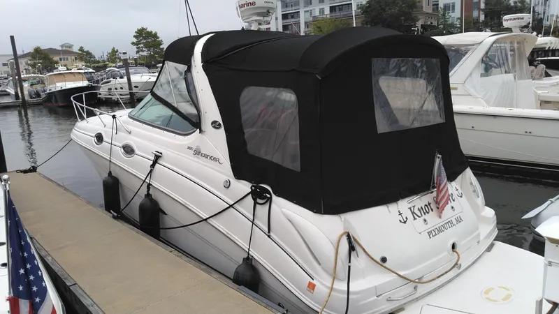 Slide: The Image of 2006 Sea Ray 280 Sundancer docked at marina with black canopy. - 5