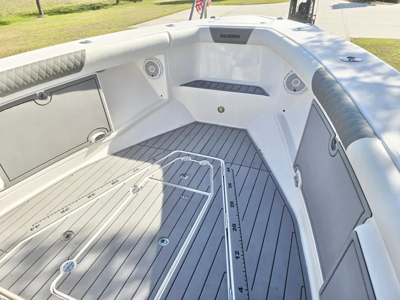 Slide: The Image of 2015 Everglades 355 Tournament boat interior with sleek deck and storage compartments. - 13