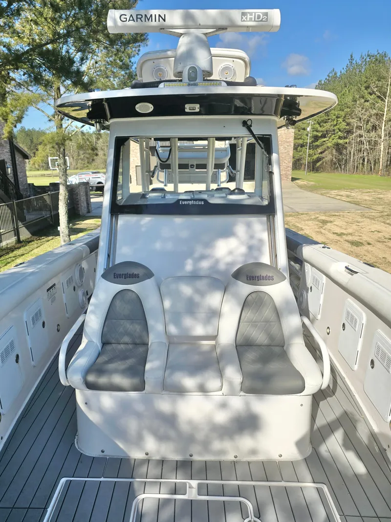 Slide: The Image of 2015 Everglades 355 Tournament boat with Garmin equipment, docked outdoors. - 16