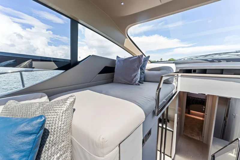 Slide: The Image of Luxurious interior of 2022 Pershing 7X yacht with plush seating and modern design. - 25