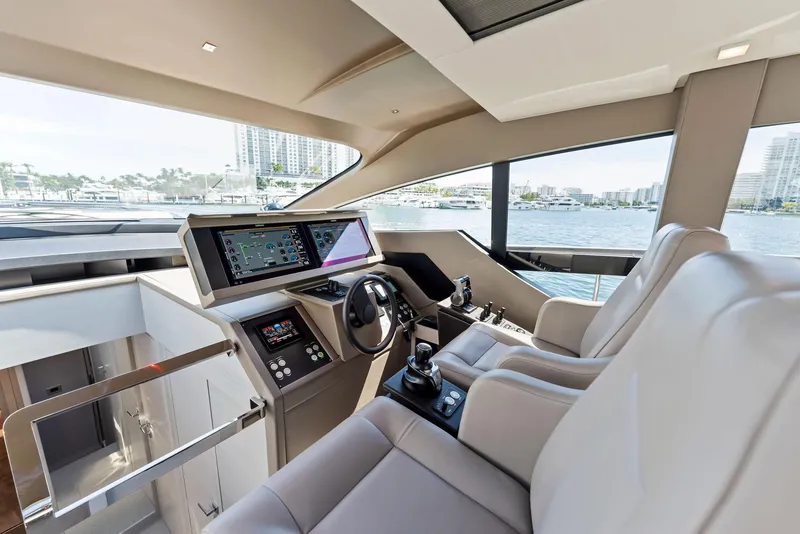 Slide: The Image of Luxurious interior of 2022 Pershing 7X yacht with modern helm and panoramic view. - 26