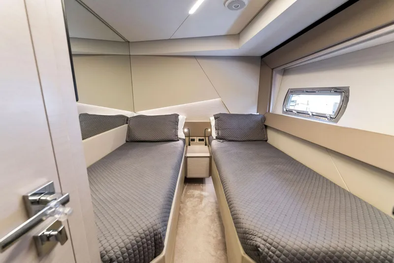 Slide: The Image of Interior of 2022 Pershing 7X yacht with twin beds and modern design. - 37