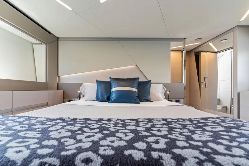 Slide: The Image of Luxurious bedroom interior of 2022 Pershing 7X yacht with modern design and elegant decor. - 42