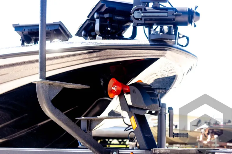 Slide: The Image of 2025 Skeeter FXR 21 Limited boat with advanced equipment on trailer. - 15