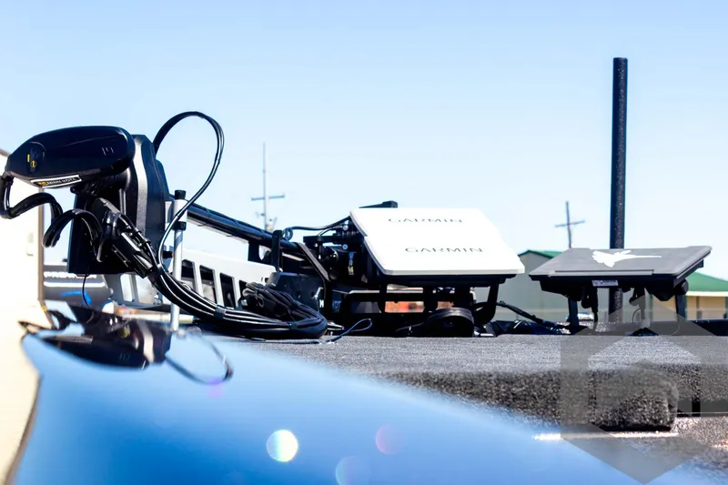 Slide: The Image of 2025 Skeeter FXR 21 Limited boat deck with advanced navigation equipment. - 25