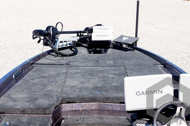 Slide: The Image of 2025 Skeeter FXR 21 Limited boat deck with Garmin electronics and trolling motor. - 26