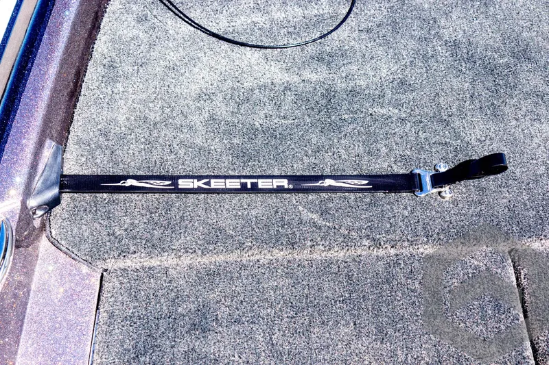 Slide: The Image of 2025 Skeeter FXR 21 Limited boat deck with branded strap. - 34
