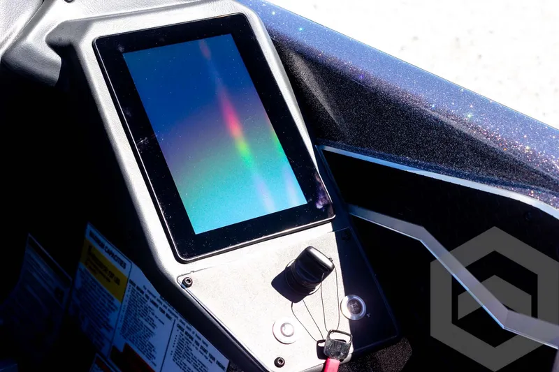 Slide: The Image of 2025 Skeeter FXR 21 Limited dashboard with touchscreen display and controls. - 40