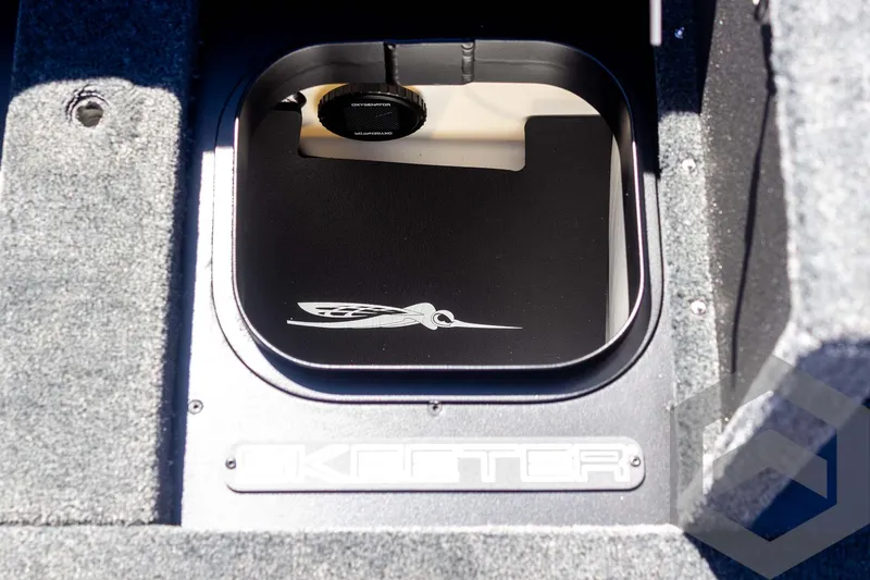 Slide: The Image of 2025 Skeeter FXR 21 Limited boat compartment with logo detail. - 48