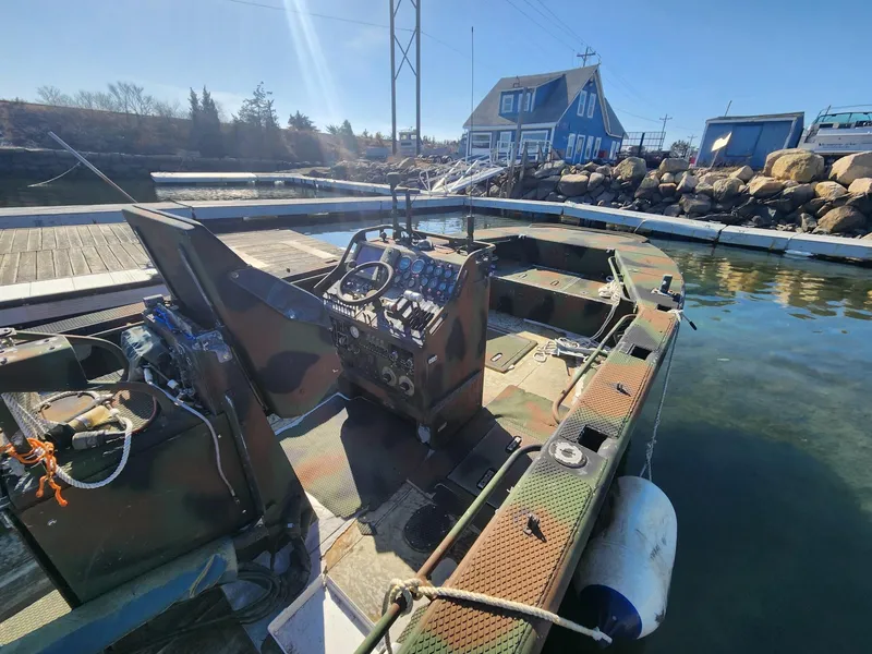 Slide: The Image of 1999 Recon SWCC Special Operations Vessel docked at a marina, showcasing its control panel. - 3